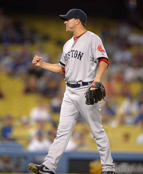 Red Sox starting pitcher Jake Peavy reacts as they defeat the Los Angeles Dodgers 8-1 in their game