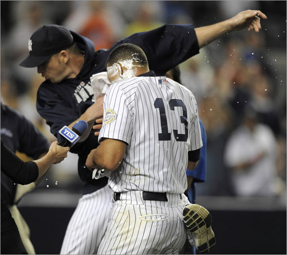 New York Yankees pitcher A. J. Burnett stuffs a shaving cream 