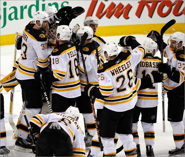 Boston Bruins goalie Tim Thomas and the Bruins celebrate after taking Game 3 putting the Canadiens on the brink of elimination facing a must win game on Wednesday.