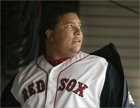 Bartolo Colon glances toward the field as he steps into the dugout before pitching for the Pawtucket Red Sox in the team's home opener minor league baseball game against the Indianapolis Indians, in Pawtucket, R.I., Thursday, April 3, 2008.