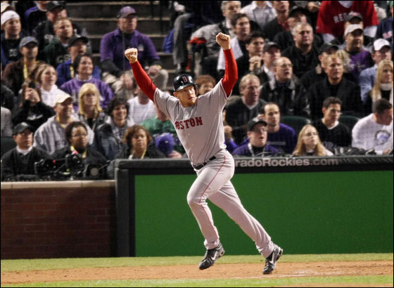 Bobby Kielty No. 32 of the Boston Red Sox watches a solo home run in the eighth inning against the Colorado Rockies during Game Four of the 2007 Major League Baseball World Series at Coors Field on October 28, 2007 in Denver, Colorado.