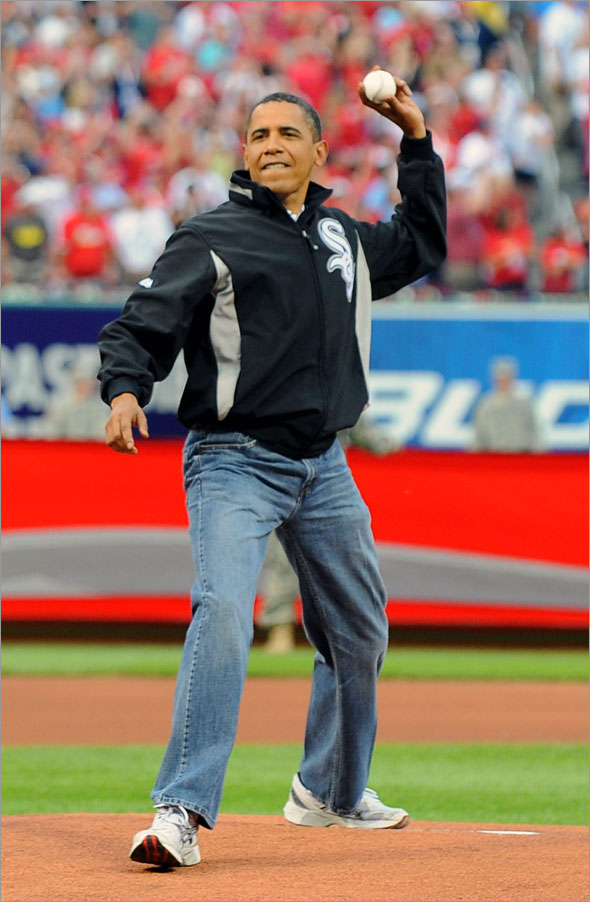 President Barack Obama throws out the first pitch before the 2009 All-Star Game at Busch Stadium July 14, 2009 in St. Louis, Missouri.