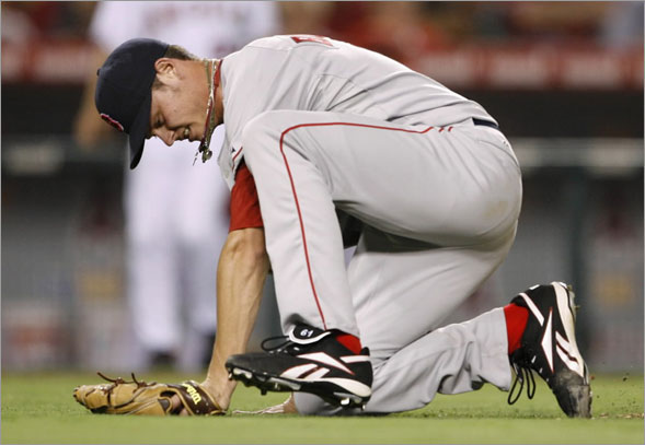 Red Sox starting pitcher Clay Buchholz reacts after being struck by a ball hit by Anaheim Angels' Vladimir Guerrero during the fifth inning of their MLB American League baseball game in Anaheim, California July 18, 2008.