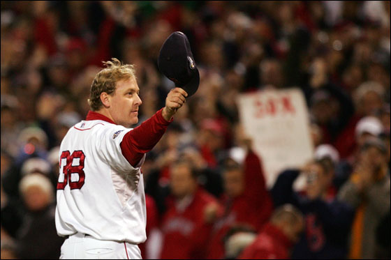 Curt Schilling of the Boston Red Sox tips his hat to the crowd as he comes out of the game in the sixth inning against the Colorado Rockies during Game Two of the 2007 Major League Baseball World Series at Fenway Park on October 25, 2007 in Boston
