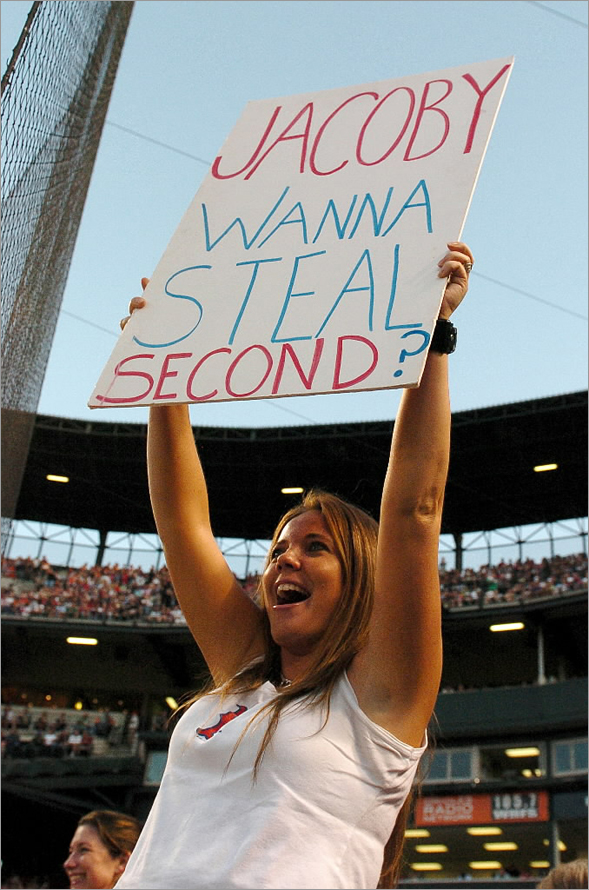 A fan holds up a sign during the game between the Boston Red Sox and the Baltimore Orioles August 20, 2008 at Camden Yards in Baltimore, Maryland.