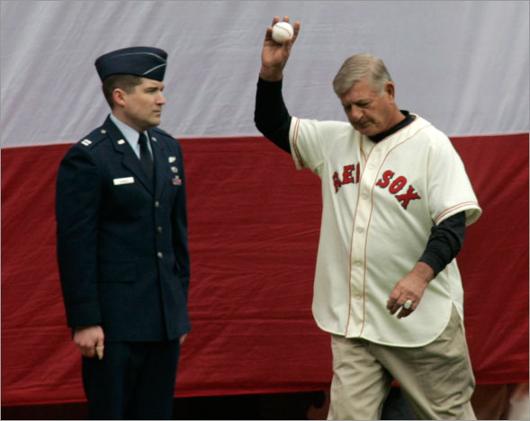 Carl Yastrzemski waved to the crowd as he entered the field on opening day.