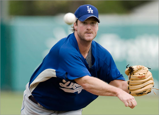 Los Angeles Dodgers starter Derek Lowe throws from the mound during the first inning of a spring training baseball game against the Boston Red Sox in Fort Myers