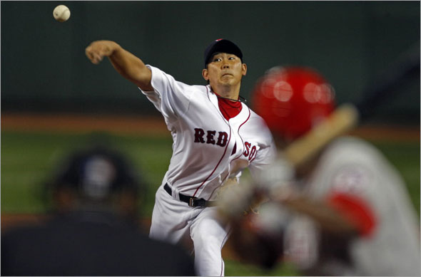 Red Sox pitcher Daisuke Matsuzaka made his return to the mound tonight after a nearly two month absence. Here he fires a first inning pitch to Angels leadoff batter Chone Figgins. The Boston Red Sox play the Los Angeles Angels of Anaheim at Fenway Park.
