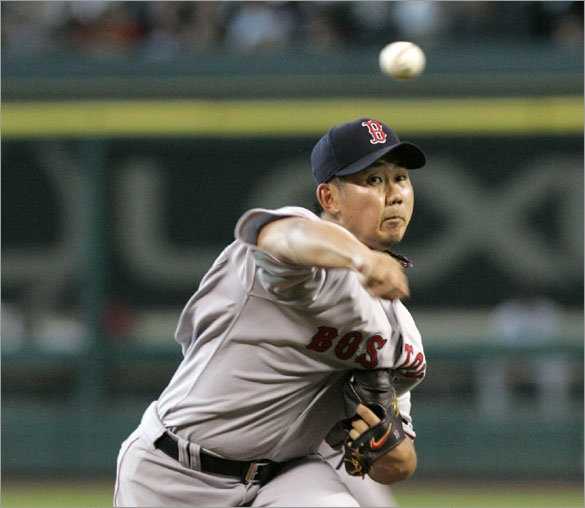 Daisuke Matsuzaka delivers a pitch in the first inning against the Houston Astros in a baseball game Friday, June 27, 2008, in Houston.