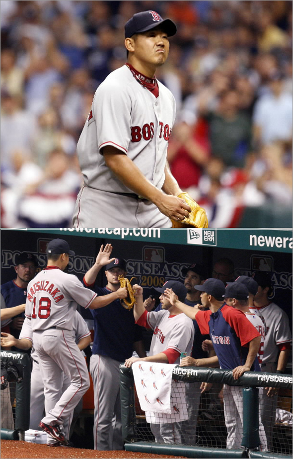 Red Sox pitcher Daisuke Matsuzaka heads to the dugout after pitching the seventh inning of game one of the American League Championship series  against the Tampa Bay Rays at Tropicana Field in St. Petersburg, Florida October 10, 2008.