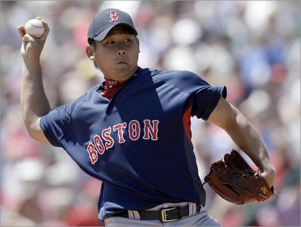 Boston Red Sox pitcher Daisuke Matsuzaka, of Japan, throws to an Atlanta Braves batter during the second inning of a spring training baseball game, Monday, March 30, 2009, in Kissimmee, Fla.