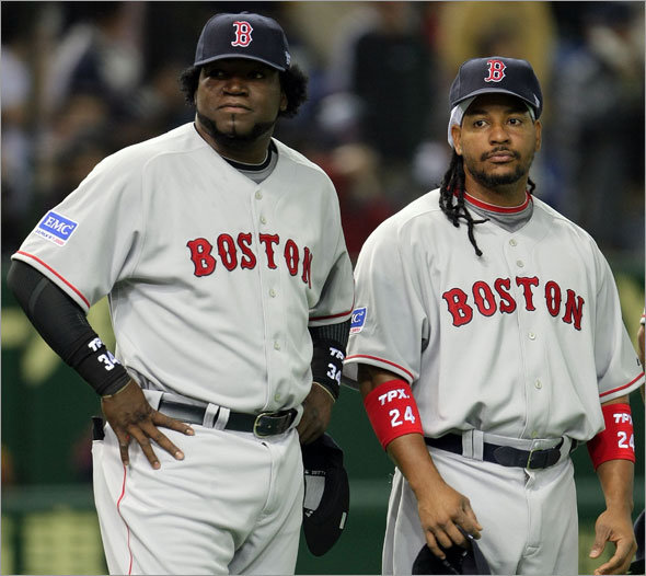 David Ortiz and Manny Ramirez of the Boston Red Sox before the start of a preseason friendly against the Yomiuri Giants at Tokyo Dome on March 23, 2008 in Tokyo, Japan. According to reports on July 30, 2009, Manny Ramirez and David Ortiz tested positive in 2003 for performance enhancing drugs.