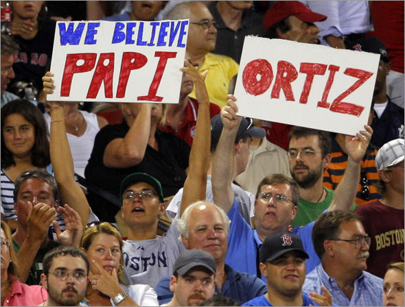 Fans show their support for Boston Red Sox's David Ortiz as he comes up to bat in the fourth inning of their MLB American League baseball game against the Detroit Tigers at Fenway Park in Boston, Massachusetts August 10, 2009.