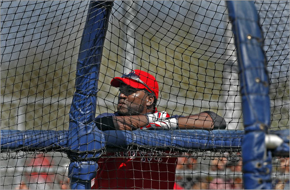 Red Sox DH David Ortiz spoke at length after the workout this morning about his left wrist injury and the steriod questions that surround the game of baseball. Here he is shown as he waits for his turn to hit in the batting cage.