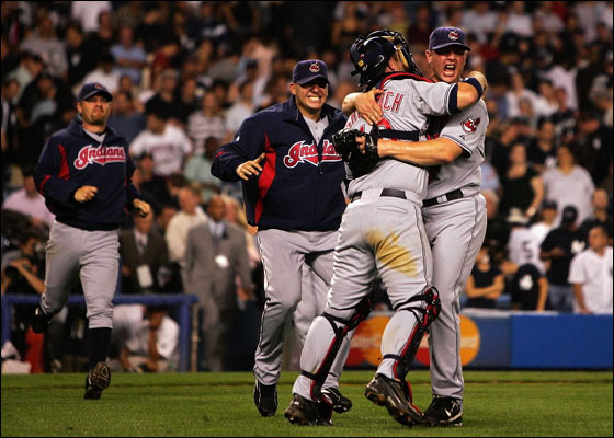 Joe Borowski  and Kelly Shoppach of the Cleveland Indians celebrate after defeating the New York Yankees by the score of 6-4 to win the American League Division Series in four games at Yankee Stadium on October 8, 2007 in the Bronx borough of New York City. 