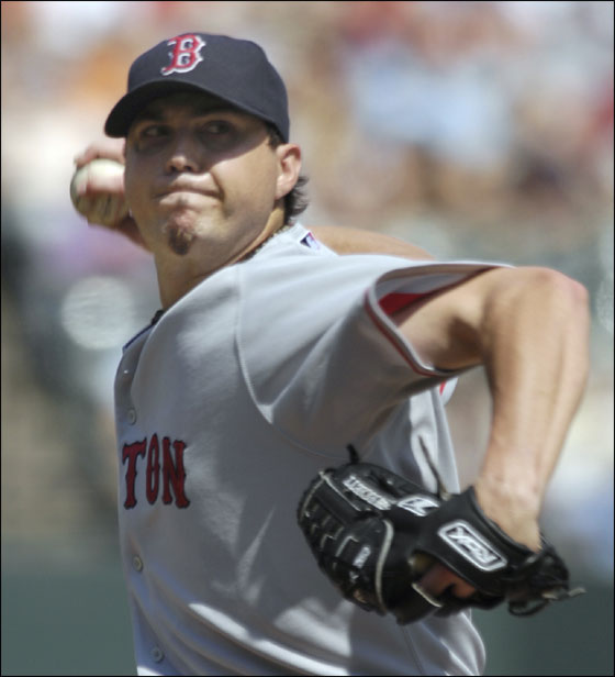 Red Sox pitcher Josh Beckett delivers against the Baltimore Orioles during the first inning of a baseball game Sunday, Sept. 9, 2007, in Baltimore. The Red Sox won 3-2.