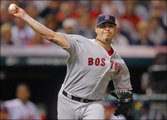 10/18/07 -- Cleveland, Ohio: Red Sox starting pitcher Josh Beckett puts some extra mustard on the throw as he gets Ryan Garko at first on a fourth inning comebacker.