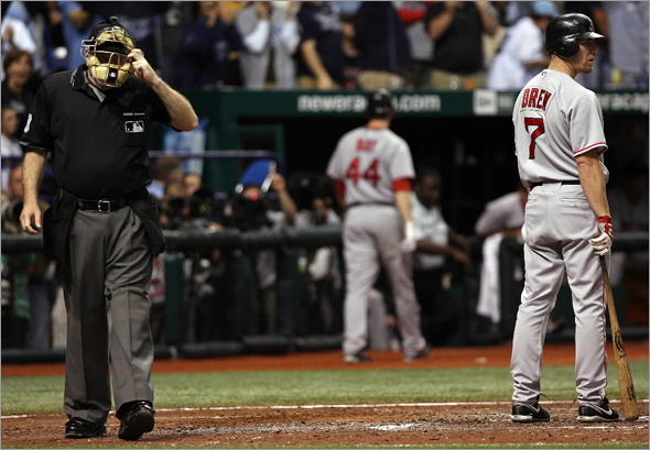 J.D. Drew of the Boston Red Sox reacts after striking out to end the eighth inning against the Tampa Bay Rays in game seven of the American League Championship Series during the 2008 MLB playoffs on October 19, 2008 at Tropicana Field in St Petersburg, Florida