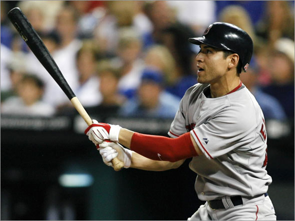 Boston Red Sox's Jacoby Ellsbury hits a three-run home run in the seventh inning of a baseball against the Kansas City Royals Wednesday, Aug. 6, 2008, in Kansas City, Mo. Sean Casey and Jason Bay also scored on the home run.