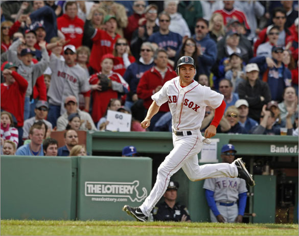 The Boston Red Sox Jacoby Ellsbury rounding 3rd base scoring from first base on teammate Jed Lowrie's double against the Texas Rangers during 8th inning action at Fenway Park on Sunday April 20, 2008.