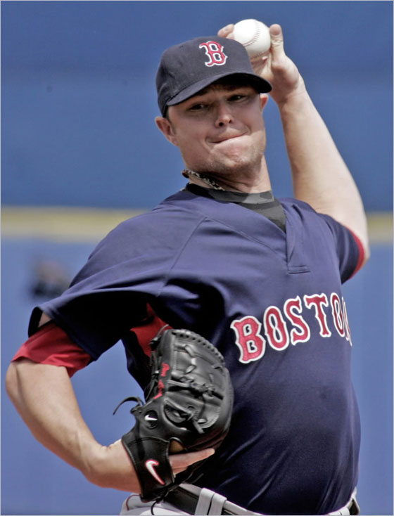 Red Sox starting pitcher Jon Lester sets to deliver his pitch in the first inning against the New York Mets during their spring training baseball game in Port St. Lucie, Fla., on Monday, March 10, 2008.