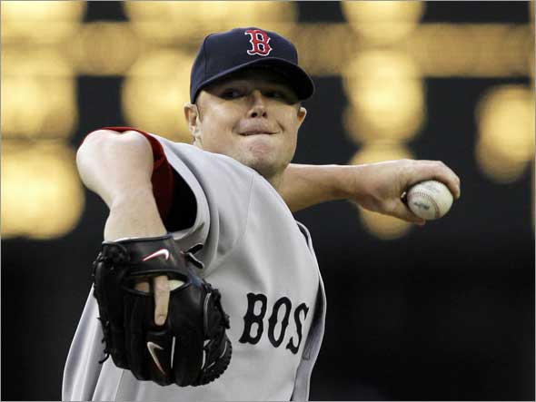 Red Sox starting pitcher Jon Lester throws against the Seattle Mariners in the second inning during a baseball game Friday, May 15, 2009, in Seattle.