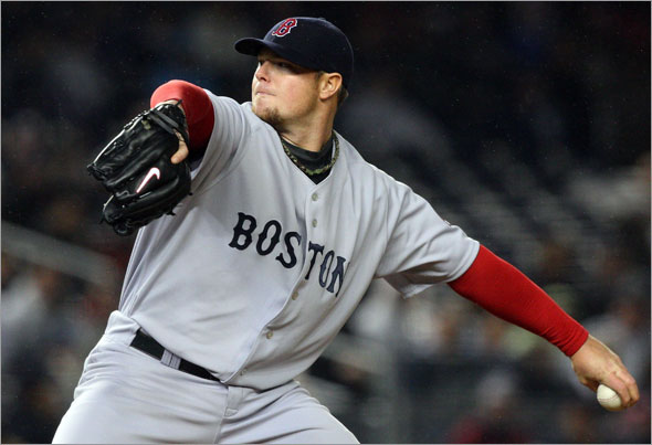 Jon Lester of the Boston Red Sox deals a pitch against the New York Yankees on May 4, 2009 at Yankee Stadium in the Bronx borough of New York City.