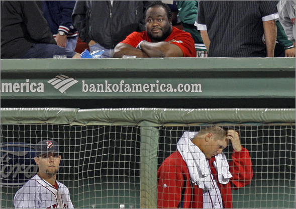 Pedroia and Papelbon leave the dugout after the devastating loss