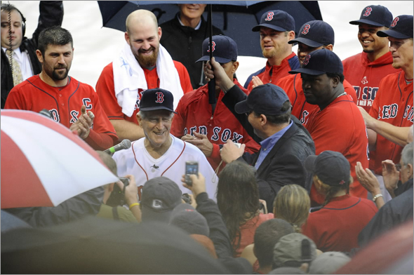 Johnny Pesky enjoys a ceremony in which his Boston Red Sox uniform number 6 is retired prior to the start of a MLB game against the New York Yankees at Fenway park in Boston, MA Sunday, September 28, 2008.