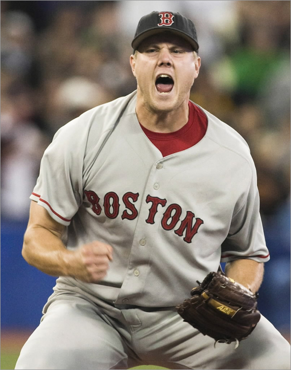 Red Sox closer Jonathan Papelbon celebrates his save against the Toronto Blue Jays during the ninth inning of their American League MLB baseball game in Toronto September 19, 2008