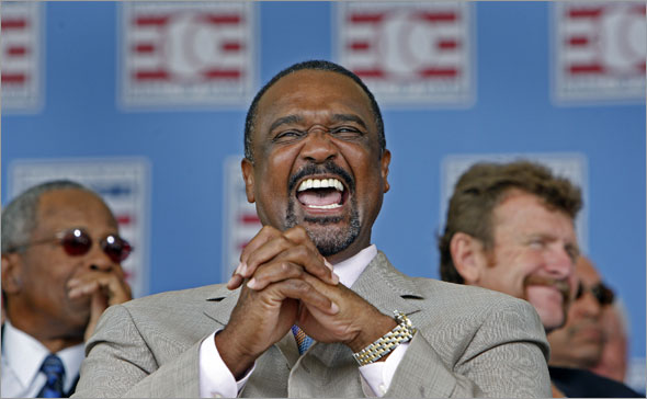 The 2009 Baseball Hall of Fame Induction Ceremony was held this afternoon on the grounds of the Clark Sports Center. Former Red Sox leftfielder Jim Rice, who was voted into the hall on his final year of eligibility is shown as he laughs during the ceremony, with fellow Hall of Famers Robin Yount, (background right) and Rod Carew (backg
round left) behind him.