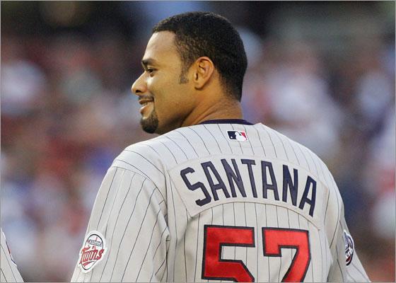 Johan Santana #57 of the Minnesota Twins looks on against the New York Mets during their interleague game at Shea Stadium June 19, 2007 in the Flushing neighborhood of the Queens borough of New York City.