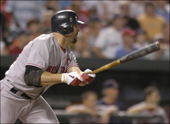 Boston Red Sox' Jason Varitek follows through on a RBI-single against the Baltimore Orioles during the ninth inning of a baseball game Thursday, Sept. 6, 2007, in Baltimore. The go-ahead run gave the Red Sox a 7-6 win.(