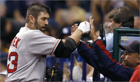 Boston Red Sox Jason Varitek celebrates solo home run in the sixth inning against the Tampa Bay Rays in Game 6 of Major League Baseball's ALCS playoff series in St. Petersburg
