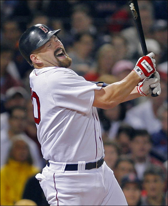 Red Sox Kevin Youkilis reacts after he couldn't lay off a high heater from Scott Kazmir and he strikes out to end the fourth inning.