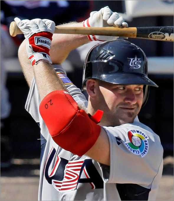 Team USA's Kevin Youkilis bats in the sixth inning against the New York Yankees in an exhibition spring baseball game in Tampa, Fla., Tuesday, March 3, 2009.