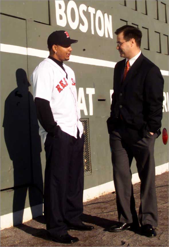 12.13.2000: Manny Ramirez and GM Dan Duquette visit out in LF by the Green Monster after today's press conference introducing Ramirez to the Boston Media.