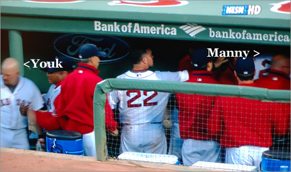 Manny has to be restrained from going after Youk