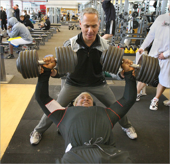 Manny Ramirez  lifts a  pair of 110 pound dumbells at  Athletes' Performance in Tempe, AZ under the direction of performance specialist Darryl Eto.