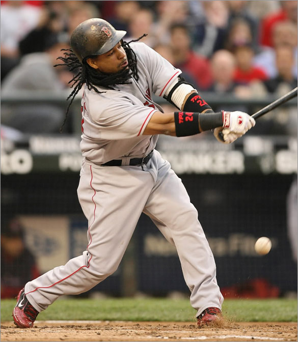 Manny Ramirez of the Boston Red Sox swings and misses at a pitch against the Seattle Mariners on May 28, 2008 at Safeco Field in Seattle, Washington.