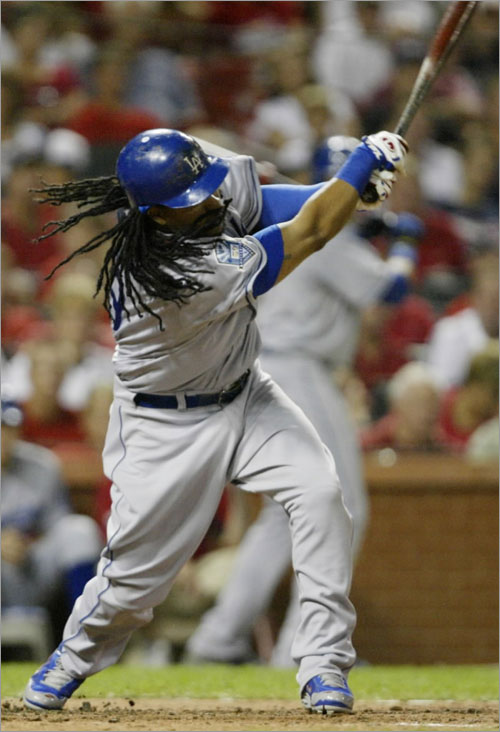 Los Angeles Dodgers' Manny Ramirez connects for a single in the fourth inning against the St. Louis Cardinals in a baseball game, Tuesday, Aug. 5, 2008 in St. Louis.