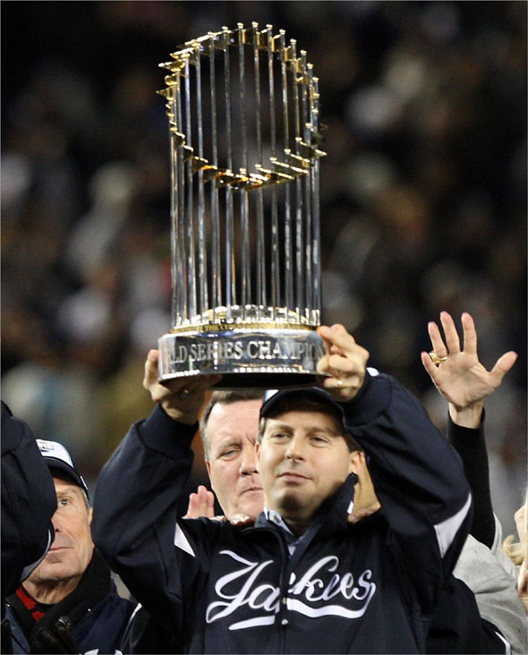 New York Yankees Managing General Partner Hal Steinbrenner of the New York Yankees celebrates with the trophy after their 7-3 win against the Philadelphia Phillies in Game Six of the 2009 MLB World Series at Yankee Stadium on November 4, 2009 in the Bronx borough of New York City. 