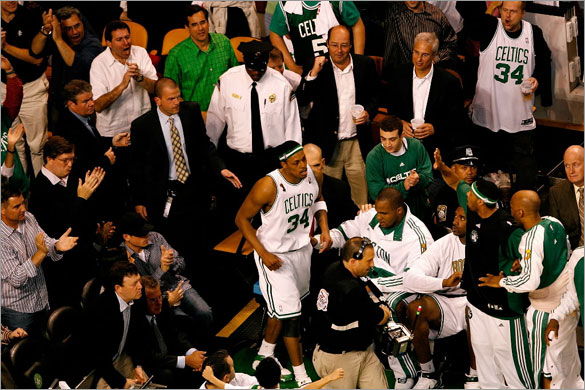 Paul Pierce of the Boston Celtics returns to the court after being taken off in a wheelchair in the third quarter of Game One of the 2008 NBA Finals against the Los Angeles Lakers on June 5, 2008 at TD Banknorth Garden in Boston, Massachusetts