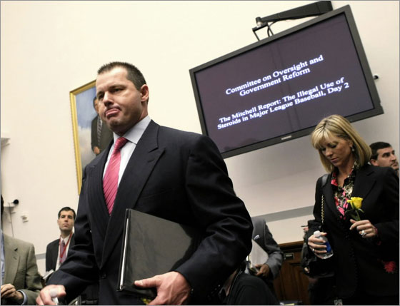 Former New York Yankees baseball pitcher Roger Clemens, left, and his wife Debbie, right, arrive on Capitol Hill in Washington, Wednesday, Feb. 13, 2008, prior to his testimony before the House Oversight, and Government Reform committee hearing on drug use in baseball.