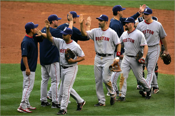The Boston Red Sox celebrate victory over the New York Yankees on July 4, 2008 at Yankee Stadium in the Bronx borough of New York City. The Red Sox defeated the Yankees 6-3.