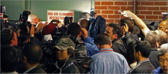 The Red Sox lost to the Blue Jays last night, and had to wait for the results of the Texas-Anaheim game to see if they can clinch the American League Wild Card playoff berth. When Texas lost on the west coast, the players celebrated in the locker room. The media was not allowed into the clubhouse, so as players came out of the door to talk, a mob scene ensued.