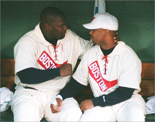 8/28/97 Boston Red Sox vs. Atlanta Braves. Mo Vaughn and Troy O'Leary admire their new old uniforms.