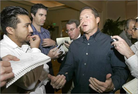 Sports agent Scott Boras is the center of attention as he is surrounded by the media upon his arrival at Major League Baseball's general managers meetings Tuesday Nov. 4, 2008 in Dana Point, Calif. 