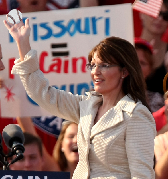 Presumptive Republican presidential nominee Sen. John McCain (R-AZ) and presumptive Republican vice-presidential nominee Alaska Gov. Sarah Palin greet the crowd during a rally August 31, 2008 in O'Fallon, Missouri. The GOP has announced it will suspend most of Monday's Republican National Committee activities in Saint Paul