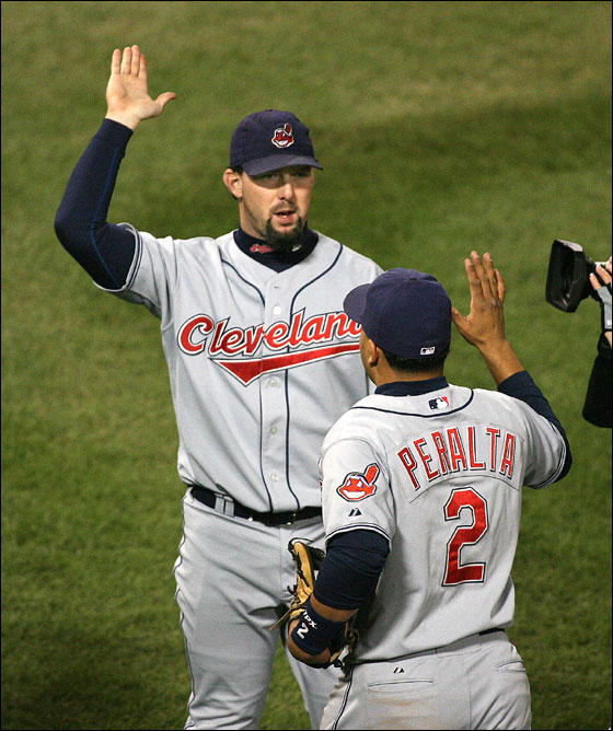 Game Two at Fenway Park. Cleveland's Trot Nixon receives congratulations from Jhonny Peralta after his game-winning hit against the Red Sox.